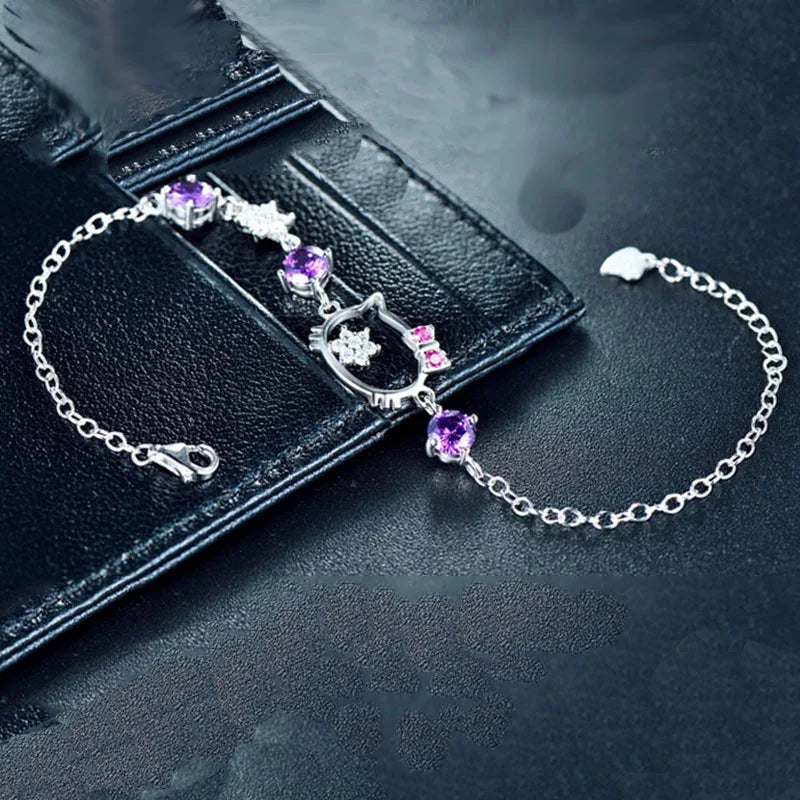 Purple Hello Kitty bracelet with cubic zirconia detail and toggle clasp
