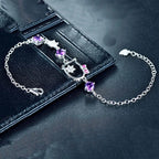 Purple Hello Kitty bracelet with cubic zirconia detail and toggle clasp